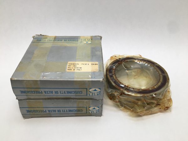 SNFA SEB85-7CE1DUM angular contact ball bearing, coated in protective wrap, beside its original boxes