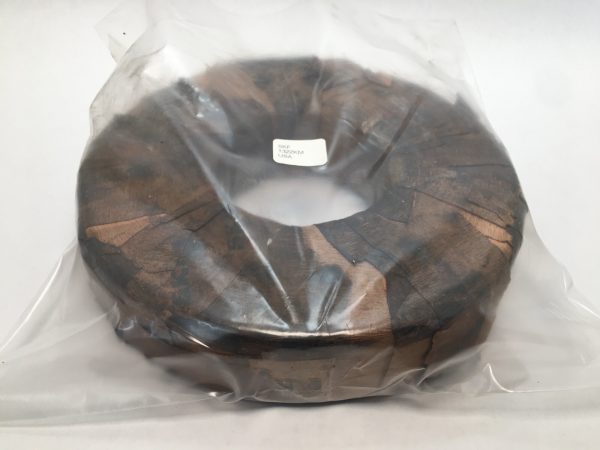 SKF 1322KM self-aligning ball bearing wrapped in plastic, showing tapered bore and brass cage