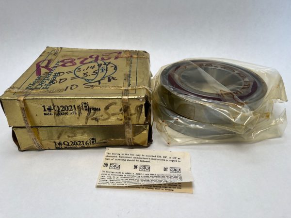 NDH Q20216DTT7038A angular contact ball bearing, 80x140x26mm, in plastic wrap beside its original box