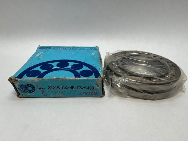 Steyr 22215 CK/MB/C3/SV20 spherical roller bearing next to its blue Steyr box
