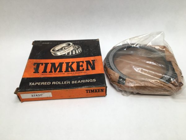 Timken 37431 tapered roller bearing cone, shown wrapped in plastic beside its Timken box