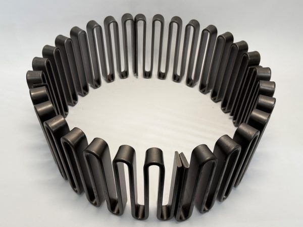 FALK 1180T coupling grid, a serpentine metal spring forming a circular ring
