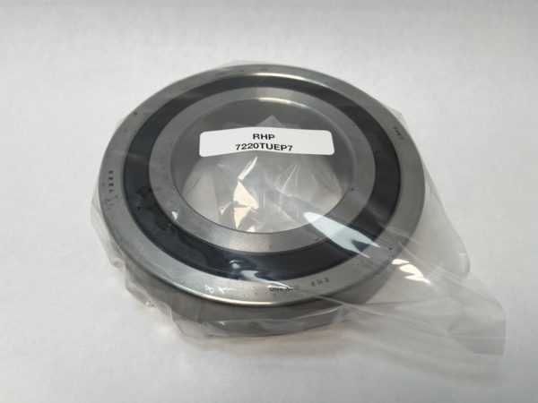 RHP angular contact ball bearing in plastic packaging, labeled 7220TUEP7
