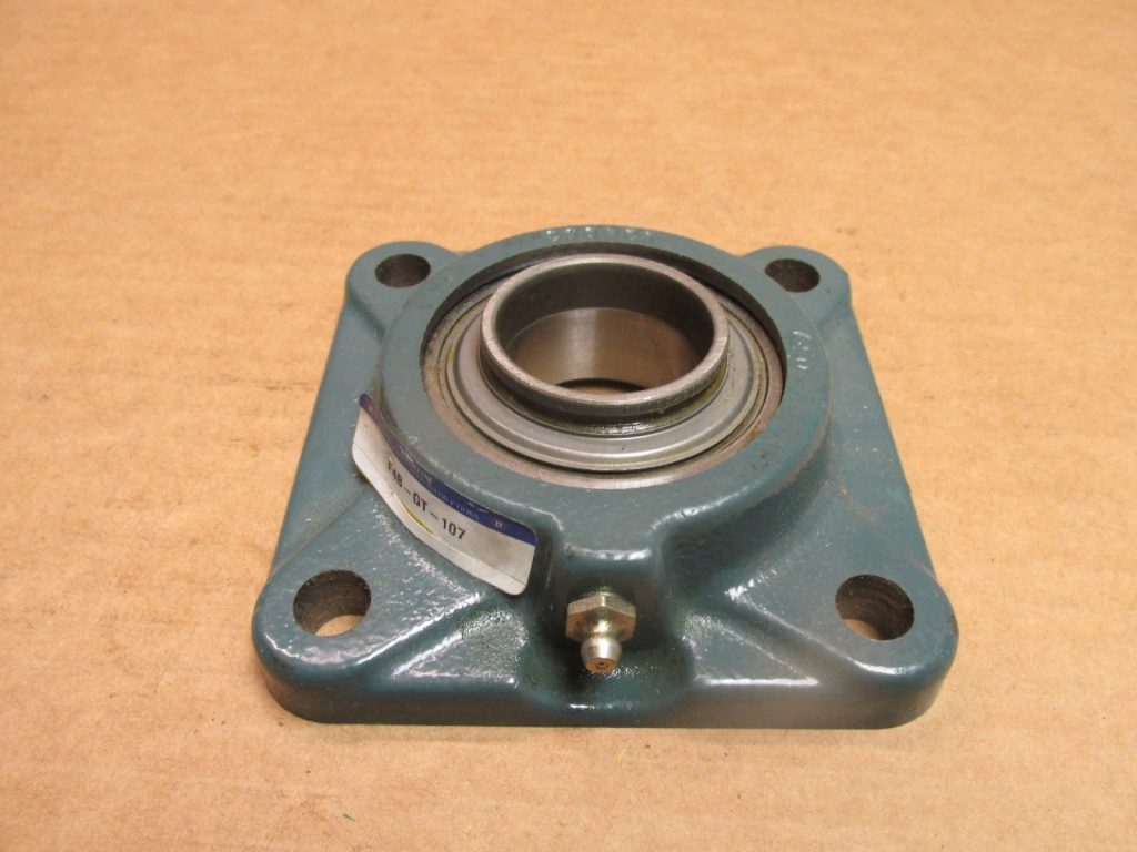 4-Bolt Flange Unit - 1.4375 in (1-7/16") Bore, Cast Iron Housing, Grip Tight Adapter Lock, Duty Type Standard.