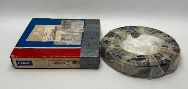 SKF 6224/C3 bearing next to its original box, wrapped in plastic