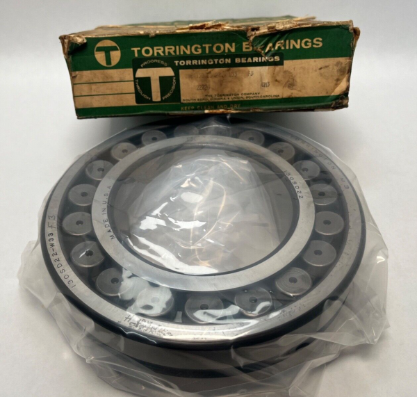 Torrington 22226W33C3 spherical roller bearing, shrink-wrapped, in front of its original Torrington Bearings box
