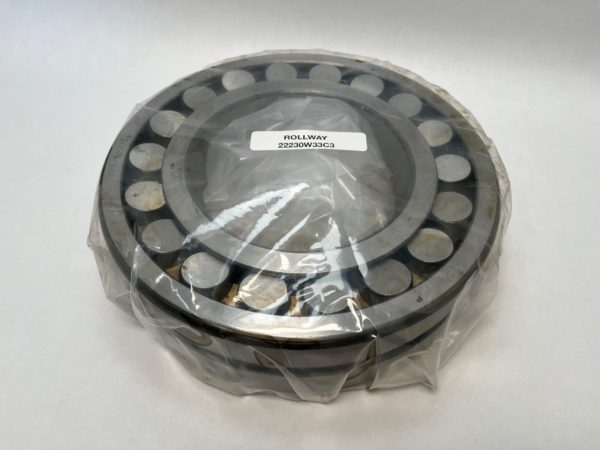 FAG 22230W33C3 spherical roller bearing in plastic wrap, showing open double row of rollers