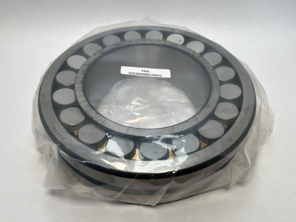 FAG 22236KMBC3W33 spherical roller bearing, tapered bore, wrapped in plastic with label visible