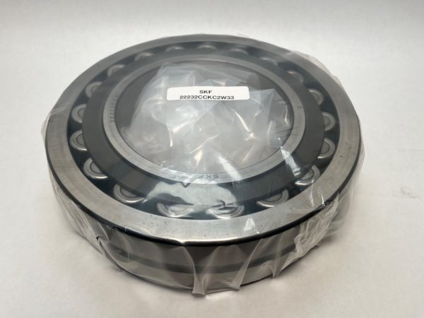 SKF 22232CCKC2W33 spherical roller bearing, wrapped in plastic, with label visible on top