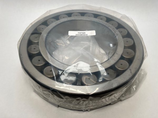 Fafnir 22238KW33 spherical roller bearing wrapped in plastic, showing label on inner ring