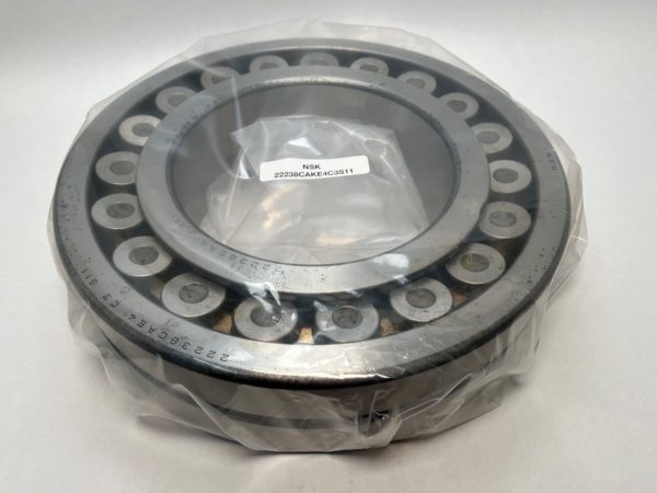 NSK 22238CAKE4C3S11 spherical roller bearing with tapered bore, wrapped in plastic with label
