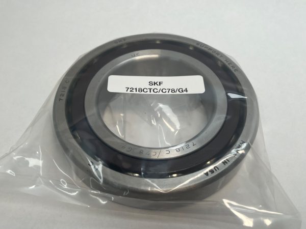 SKF 7218CTC/C78/G4 angular contact ball bearing in plastic packaging, labeled with part number