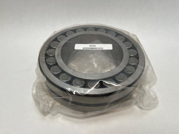 NTN 22224BKD1C3 spherical roller bearing with tapered bore, wrapped in plastic, labeled with part number