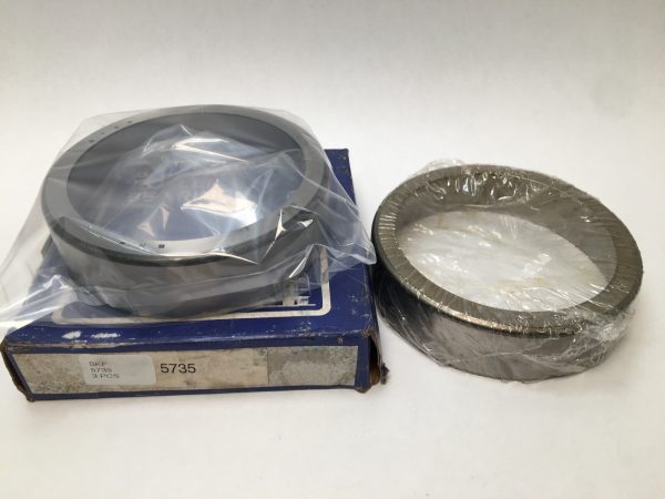 SKF 5735 taper bearing cup, one wrapped in plastic beside original SKF box labeled 5735, 3 pcs