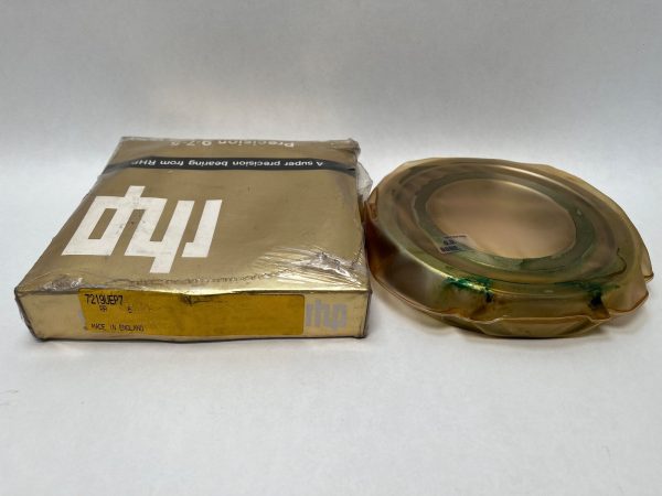RHP 7219UEP7 angular contact ball bearing wrapped in plastic beside its original labeled RHP box