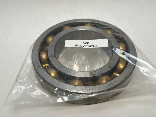 SKF 6220YC782G5 open deep groove ball bearing in plastic packaging, labeled with part number