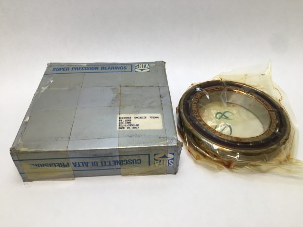 SNFA EX90-9CE3TDM angular contact ball bearing beside its original labeled packaging box