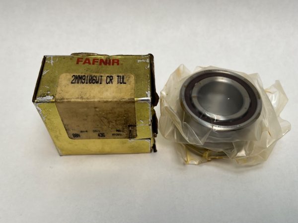 Fafnir 2MM9106WICRTUL angular contact ball bearing beside its original labeled box, wrapped in plastic