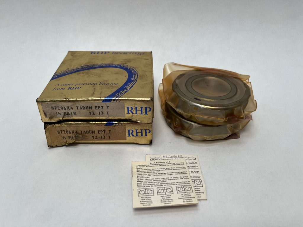 RHP 7206ATDUMP4 angular contact ball bearing matched pair, two bearings in plastic wrap beside original RHP boxes