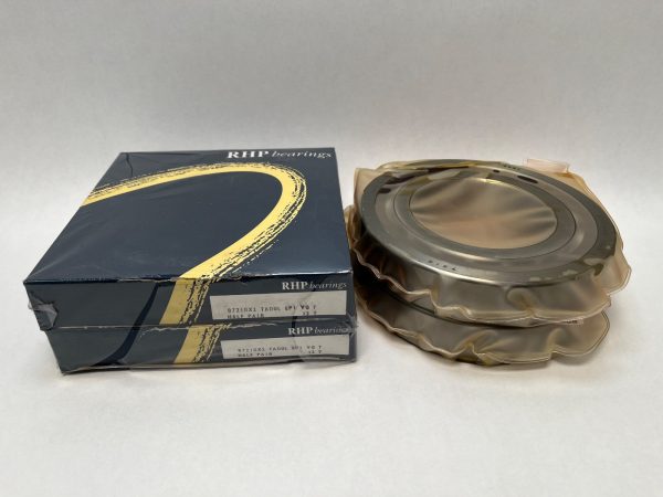 RHP 7218CTBDUL angular contact ball bearing duplex pair, shrink-wrapped, beside stacked RHP bearings boxes