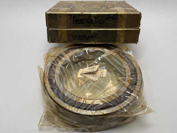 NDH QH0L28EDTL5A angular contact ball bearings, coated and wrapped in plastic, stacked on two labeled boxes