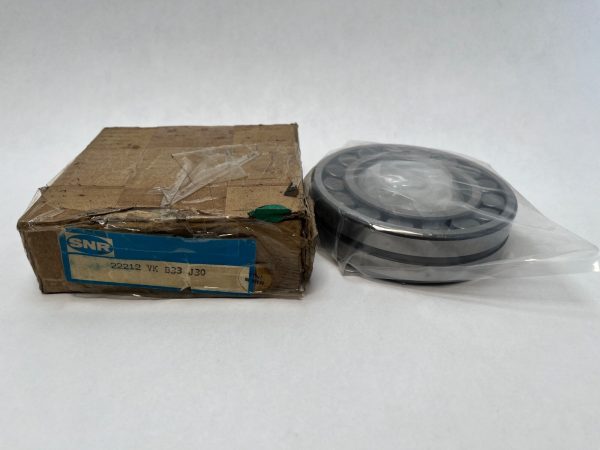 SNR 22212VK B33 J30 spherical roller bearing in plastic wrap next to its original cardboard box