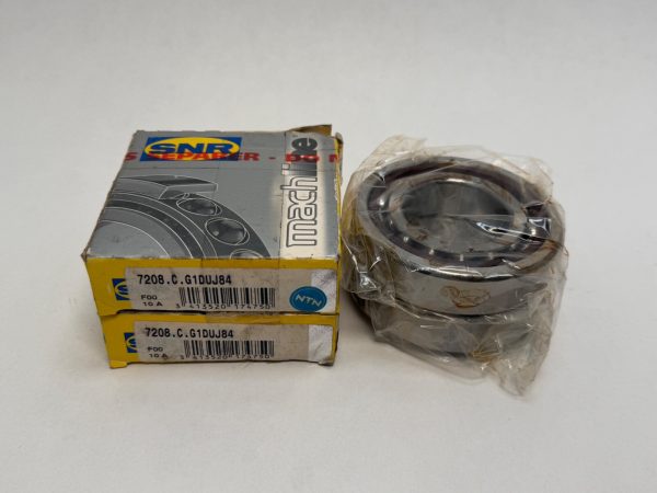 SNR 7208.C.G1DUJ84 angular contact ball bearing, shrink-wrapped, beside two labeled boxes