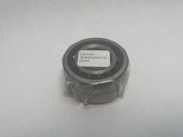 Shrink-wrapped bearing with Fafnir label, viewed from the side
