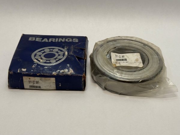 SKF 6311-2Z deep groove ball bearing, shrink-wrapped, next to its original worn SKF bearing box