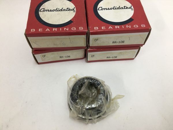Four Consolidated RA-106 bearing boxes behind one plastic-wrapped ball bearing insert