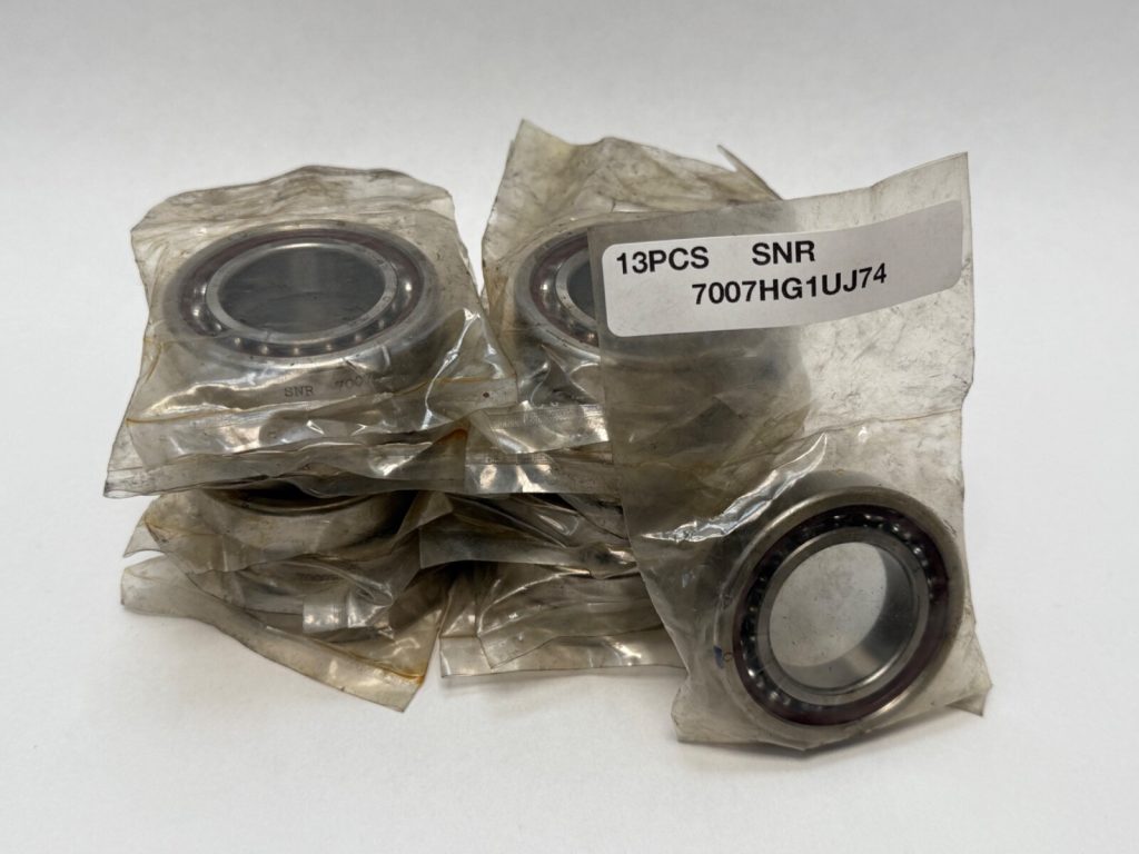 SNR 7007HG1UJ74 angular contact ball bearings individually wrapped in plastic, labeled 13PCS