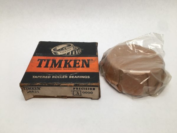 Timken tapered roller bearing cone in original box, next to unit wrapped in plastic
