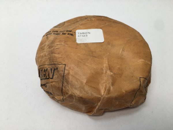 Timken 47423 tapered roller bearing cup wrapped in rust-preventive paper with label
