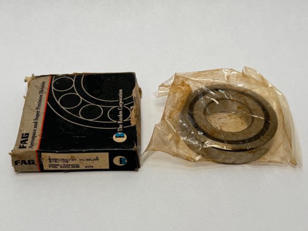 Barden BSB035072T angular contact ball bearing in plastic wrap beside its original FAG Barden box