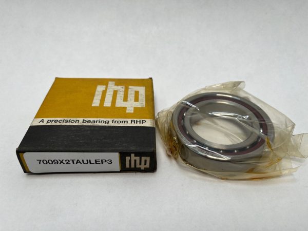 RHP angular contact ball bearing 7009X2TAULEP3, in plastic wrap, next to its yellow and black box