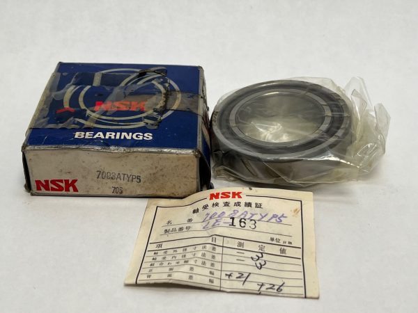 NSK 7008ATYP5 angular contact ball bearing in plastic wrap next to its box and inspection certificate
