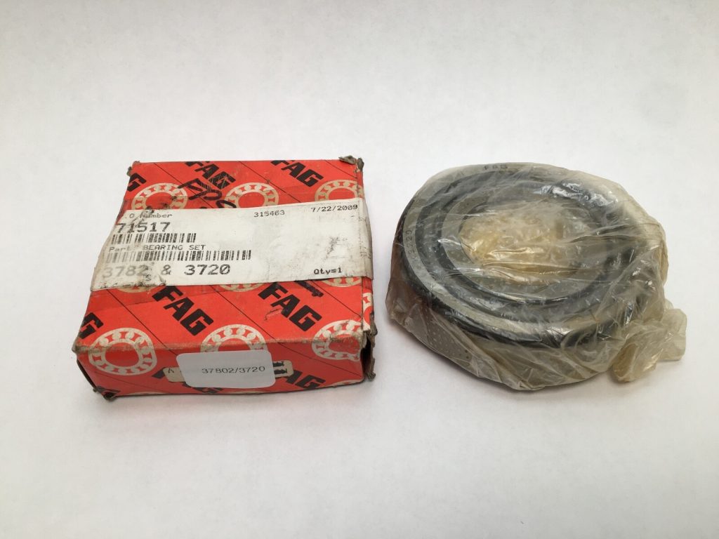 FAG 3782/3720 tapered roller bearing cone and cup set, shrink-wrapped, next to its red FAG box