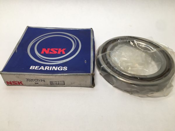 NSK 7020CTYP4 angular contact ball bearing, shrink-wrapped, next to its NSK Bearings box