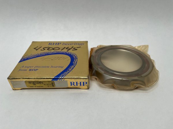 RHP 7013ETDUMP4 angular contact ball bearing in shrink wrap beside its original gold RHP box
