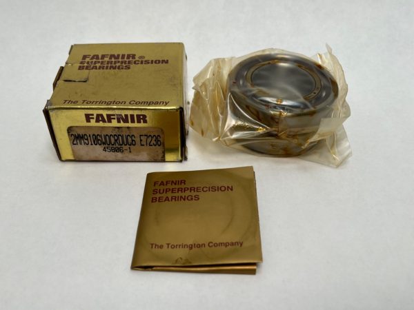 Fafnir 2MM9106WOCRDUC6 angular contact ball bearing, oil-coated, next to its gold Fafnir Superprecision Bearings box