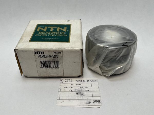NTN 7008UDB+16/GNP5 angular contact ball bearing pair, shrink-wrapped, beside its NTN Super Precision box