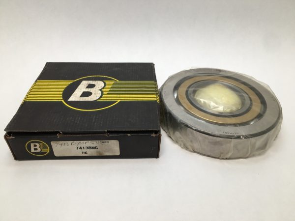 FAG 7413-B-M-P5-UL angular contact ball bearing, shrink-wrapped, beside its FAG box