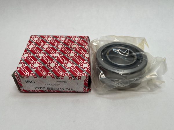 IBC 7207BEPP5DUL angular contact ball bearing in plastic wrap next to its branded box