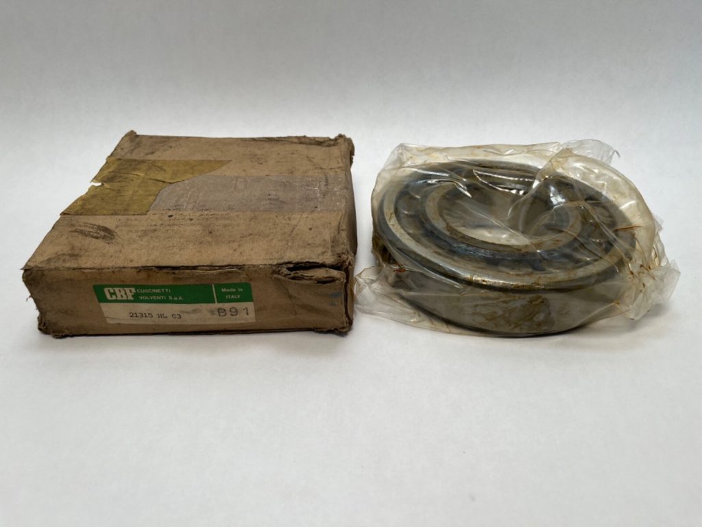 CBF 21315HLC3 spherical roller bearing, 75x160x37 mm, shown shrink-wrapped beside its original cardboard box