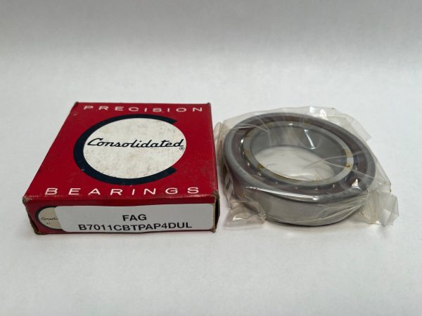 FAG B7011CBTPAP4UL angular contact ball bearing, in plastic wrap, next to its Consolidated Bearings box