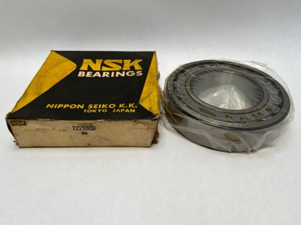 NSK 22218CD spherical roller bearing, shrink-wrapped, next to its original NSK Bearings box