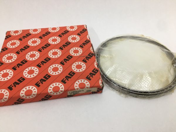 FAG L10RA500YH thin section ball bearing, shrink-wrapped, next to its red FAG box