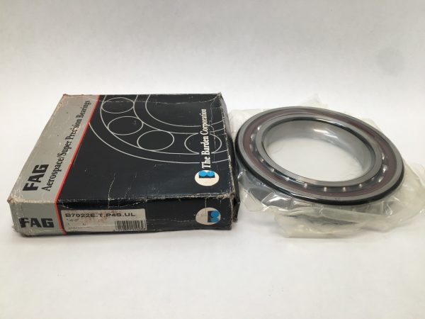 Barden B7022ETP4SUL angular contact ball bearing, open, shown in plastic wrap beside its original FAG box