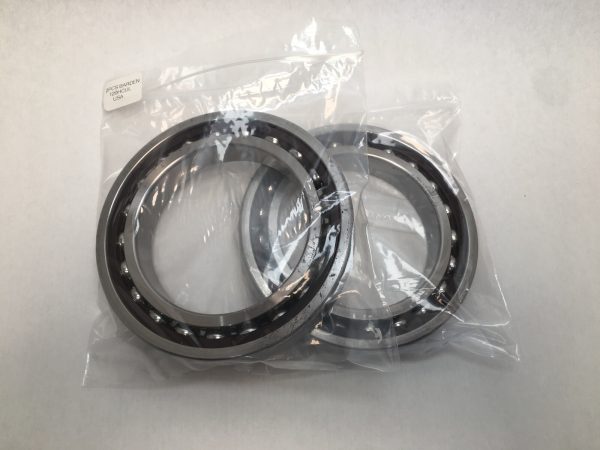 Two Barden 120HCUL angular contact ball bearings sealed together in a plastic bag with label
