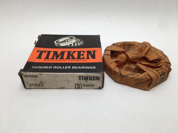 Timken 29521-3 tapered roller bearing cup box next to bearing wrapped in paper packaging